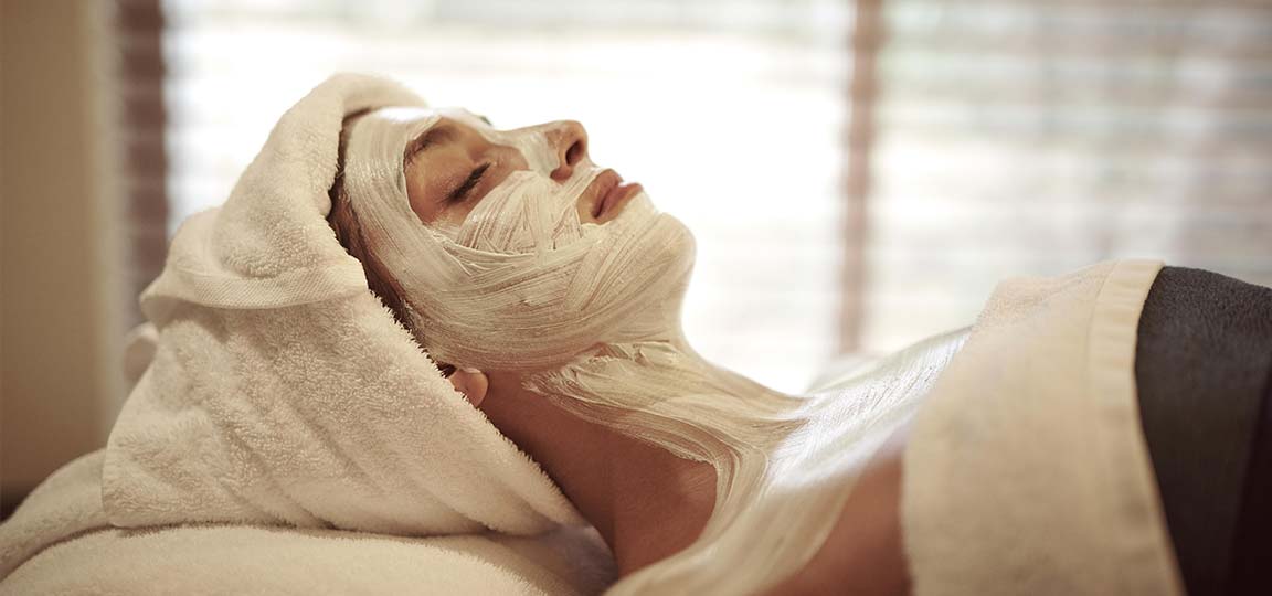 Woman in spa with face cream | Golden Door Australia